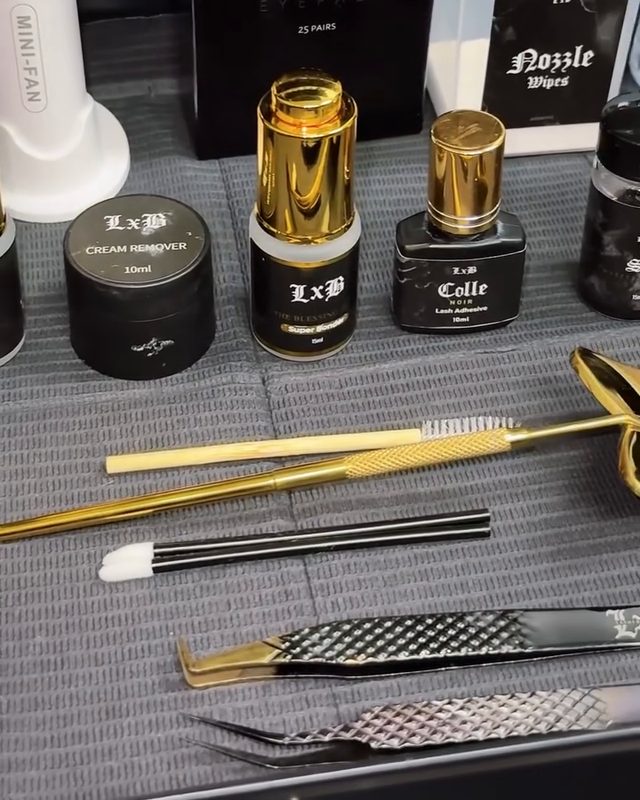 LxB tweezers, adhesive and tools on a lash cart